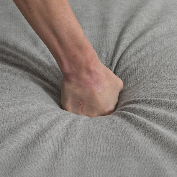 Modern L-shaped corner sofa with ottoman, light grey