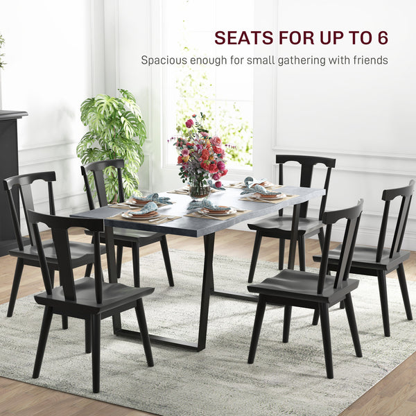 Industrial dining table with wavy edge top and steel legs, seats up to 6, cement gray