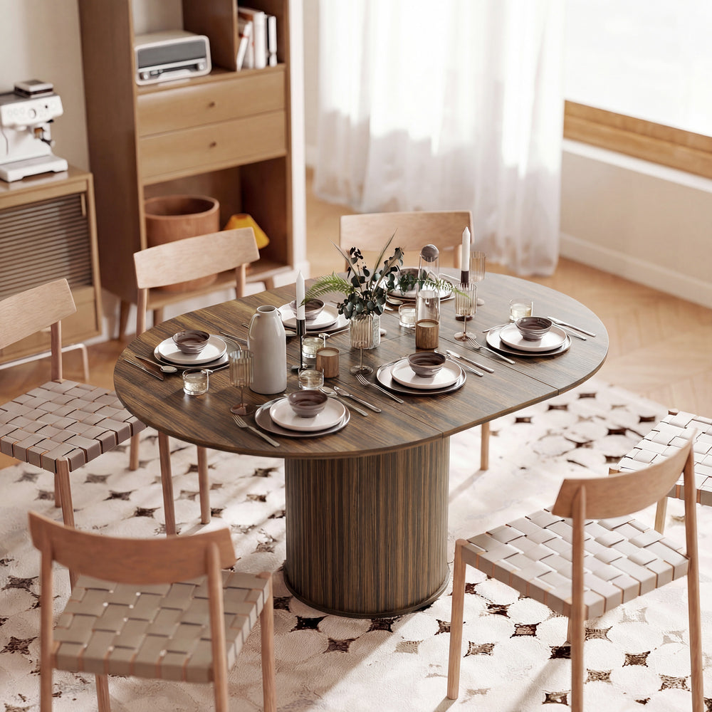 Extendable kitchen table for 6 to 8 people, farmhouse style, with a central pedestal and a walnut finish.