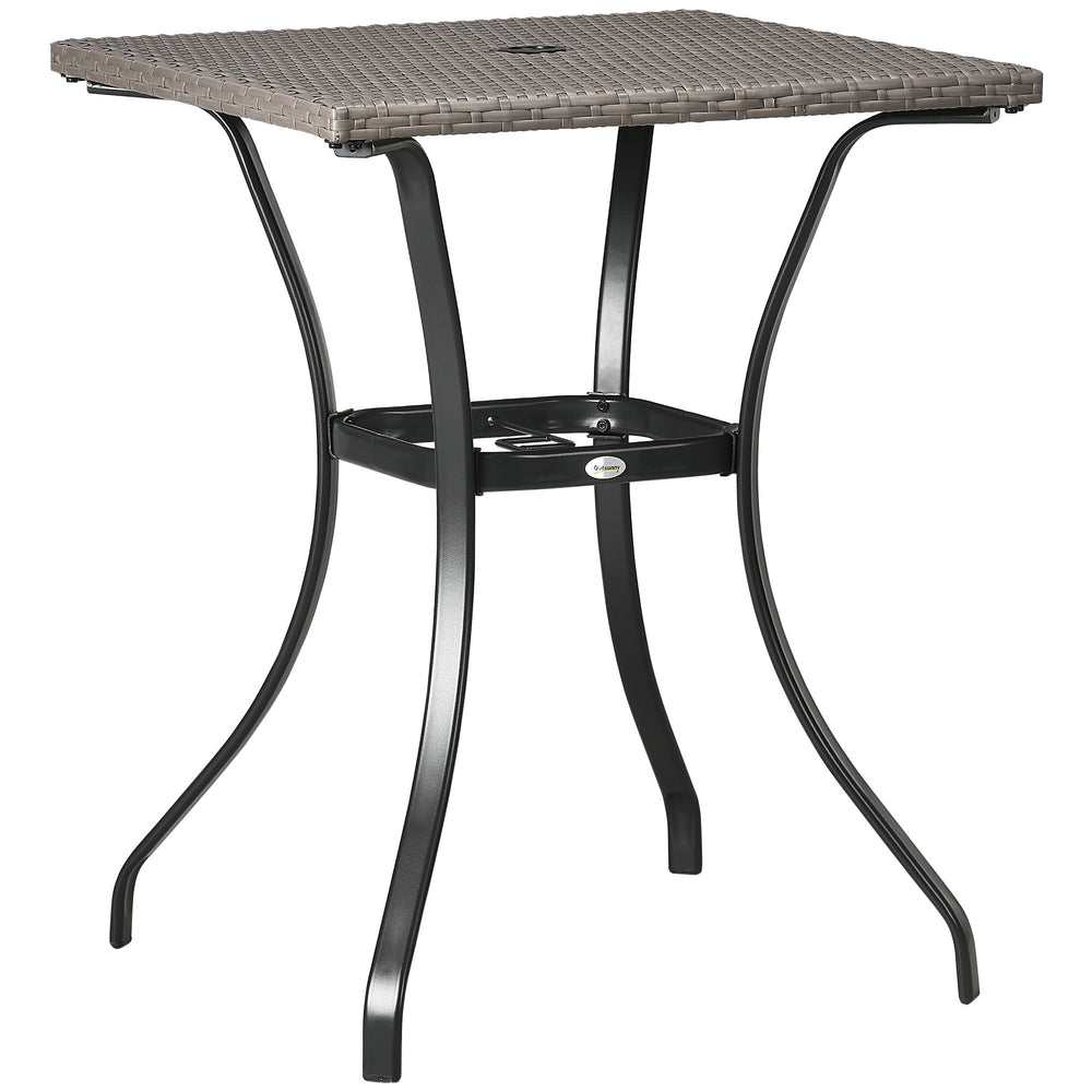 Outdoor coffee table in woven resin with a hole for a parasol, light grey