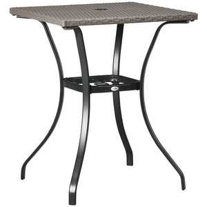 Outdoor coffee table in woven resin with a hole for a parasol, light grey