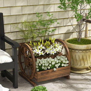 Wooden planter in the shape of a cart