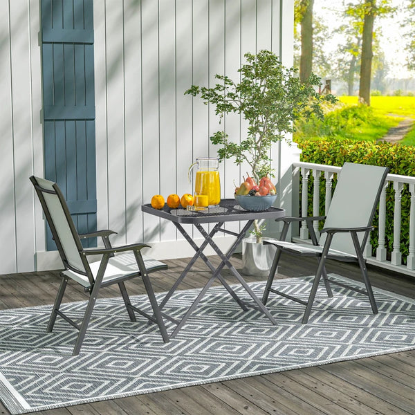 Folding square patio table with a gridded rattan top
