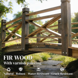Charred wooden arch bridge with safety railings