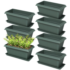 Set of 7 plastic flower pots with drainage holes and saucers