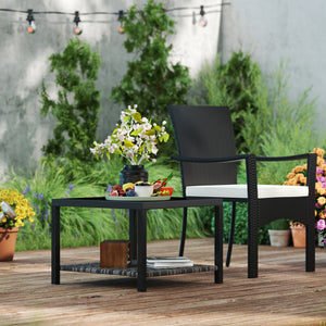 Outdoor coffee table with tempered glass top and storage shelf, black