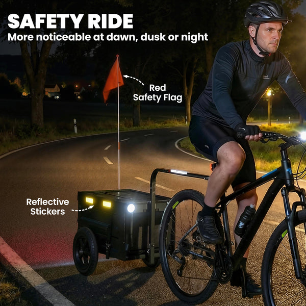 Bicycle trailer with foldable storage box and lid, quick-release wheels, reflective stickers, and safety flag