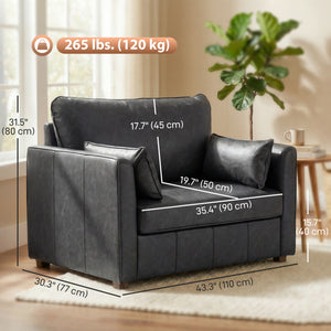 Faux leather accent chair with wide seat, spring cushion, rubberwood legs, 2 pillows, black