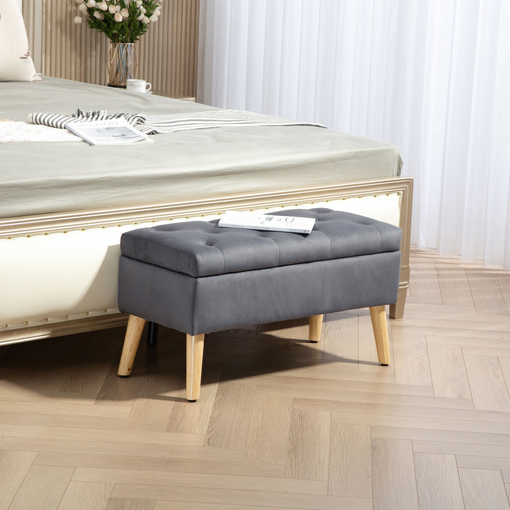 Storage ottoman with velvet upholstered lid and wooden legs, anthracite grey