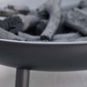 Round wood-burning fireplace, black