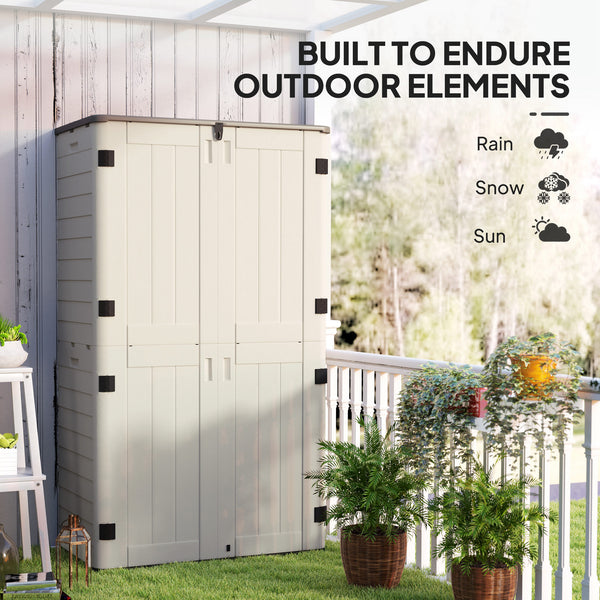 Outdoor storage cabinet with hinged lid and lockable doors