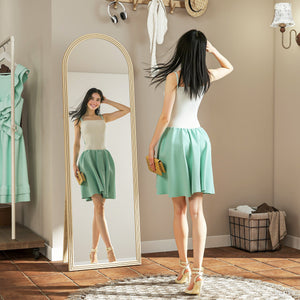 Full length arched floor mirror with faux stone frame, beige