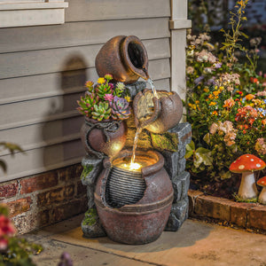 Outdoor fountain with 4-tier rustic pot, LED lighting, and adjustable flow.