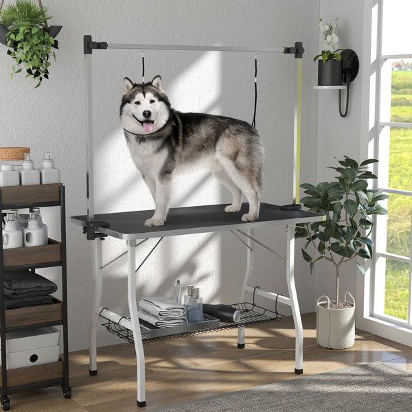 Foldable grooming table with adjustable grooming arms and storage shelf, black