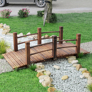 Wooden garden bridge with decorative side railings, stained wood