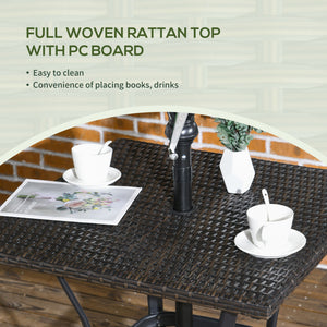 Outdoor coffee table in woven resin with a hole for a parasol, brown