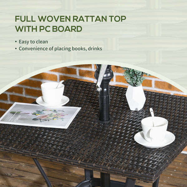 Outdoor coffee table in woven resin with a hole for a parasol, brown