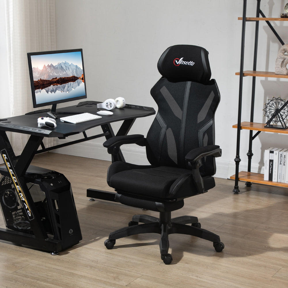 Ergonomic gaming chair with footrest, black