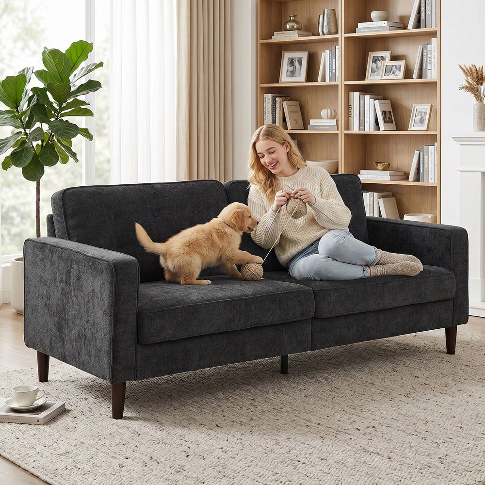 Tufted 3-seater sofa with padded cushions and wooden legs, dark grey.