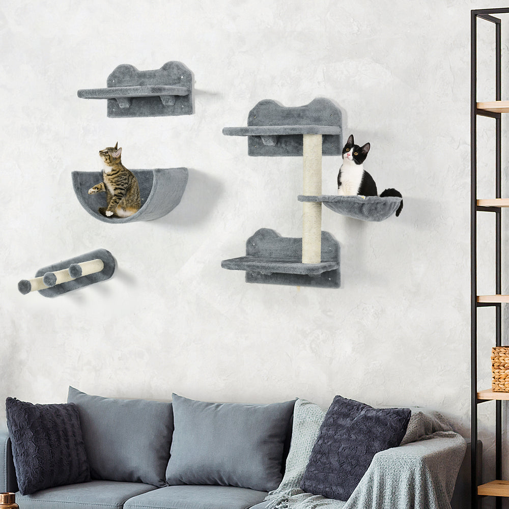 Wall-mounted cat shelves including a hammock and scratching post, grey