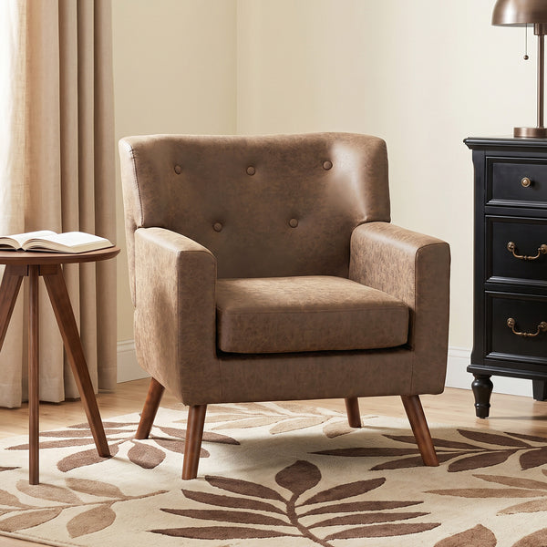 Tufted armchair in brown faux leather, wooden legs