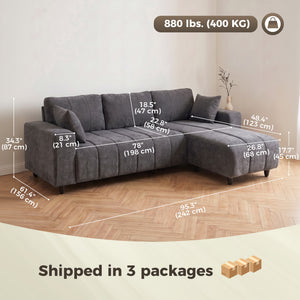 L-shaped sectional sofa with reversible chaise and pocket springs, dark gray