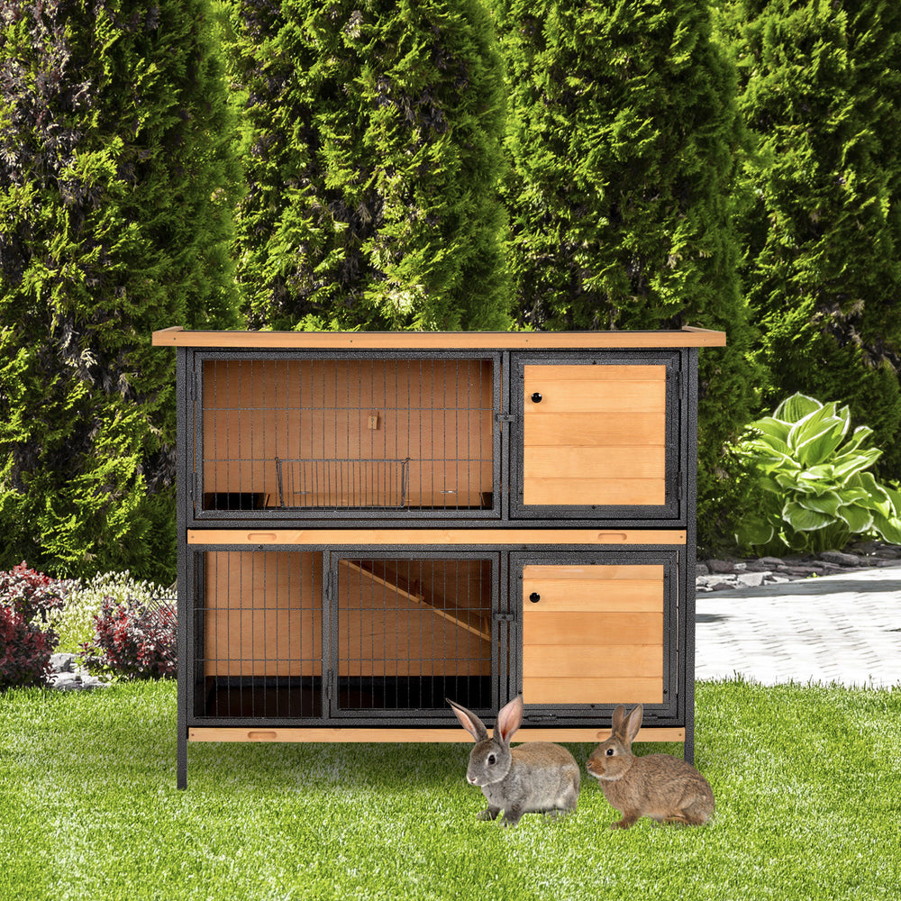 2-story rabbit hutch with ramp, feeder, and lockable doors