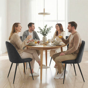 Set of 4 modern dining chairs with metal legs, shell back, and upholstered seat, black.
