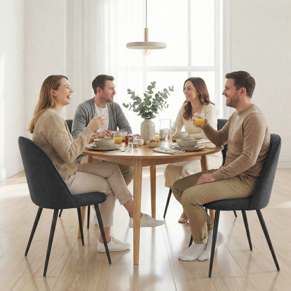 Set of 4 modern dining chairs with metal legs, shell back, and upholstered seat, black.