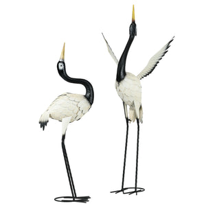 Set of 2 heron statues, white and black