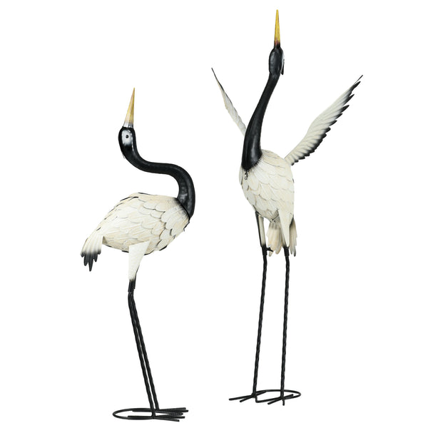 Set of 2 heron statues, white and black