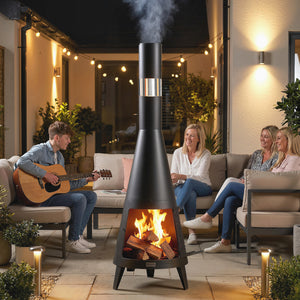 Outdoor wood-burning fire pit with chimney, poker, and spark screen, black