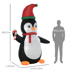 Inflatable penguin holding a 2.4 meter candy cane