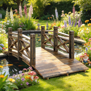 Charred wooden arch bridge with safety railings