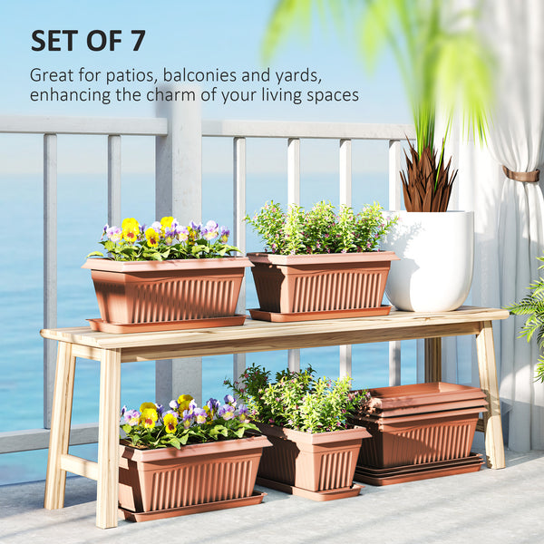Set of 7 plastic flower pots with drainage holes and saucers, brown