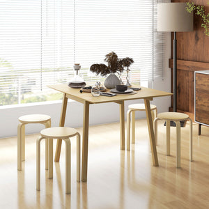 Set of 4 round stackable wooden stools for small spaces – Natural