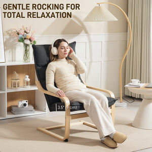 Upholstered accent chair with curved legs and armrests, dark gray