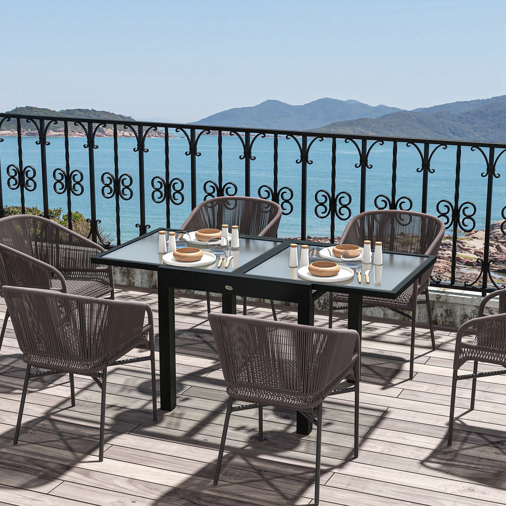 Extendable dining table in aluminum and tempered glass