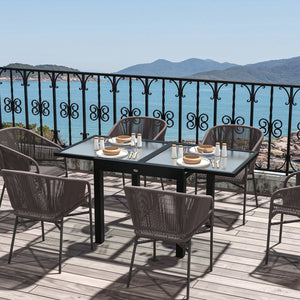 Extendable dining table in aluminum and tempered glass