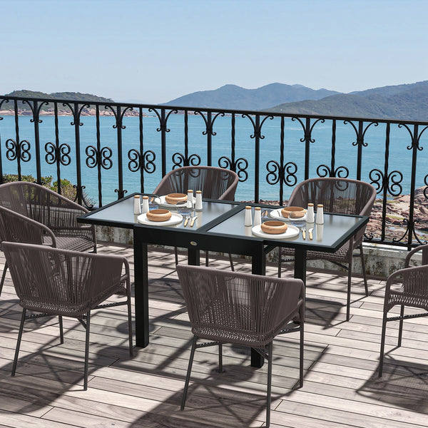Extendable dining table in aluminum and tempered glass