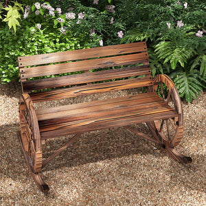Two-seater outdoor wooden rocking bench with wagon wheel shaped armrests