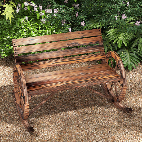 Two-seater outdoor wooden rocking bench with wagon wheel shaped armrests