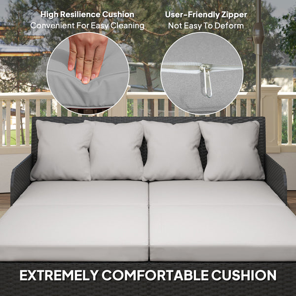 Outdoor rattan sun lounger with soft cushions, 4 pillows, curved backrest and armrests, light grey