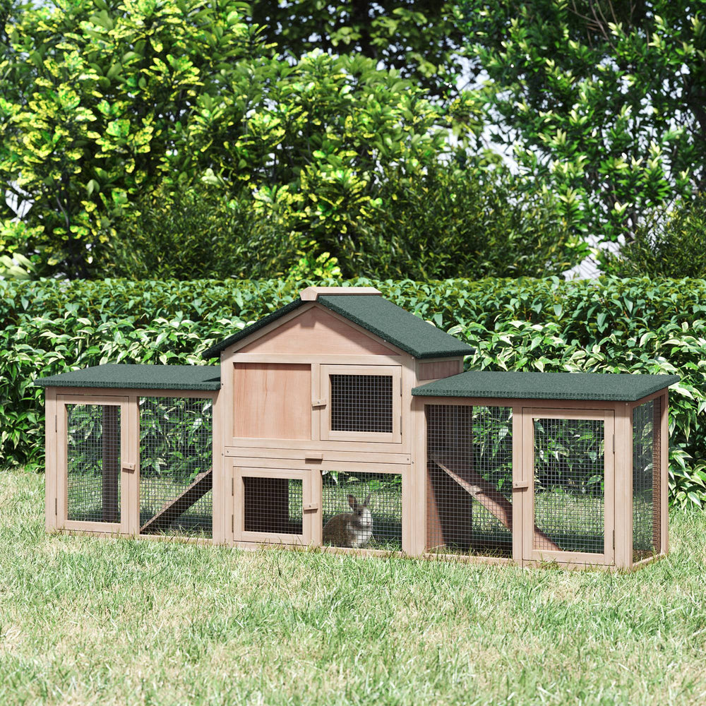 Large wooden hutch with double enclosure, pull-out tray and access ramps