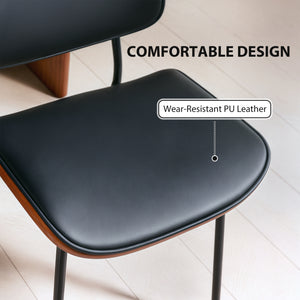 Set of 2 mid-century modern chairs with curved wooden backs and metal legs