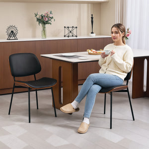 Set of 2 mid-century modern chairs with curved wooden backs and metal legs