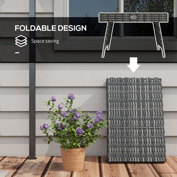 Folding outdoor side table in woven rattan