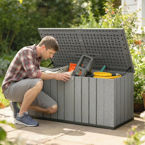 Large capacity outdoor storage box with lockable lid and gas struts.