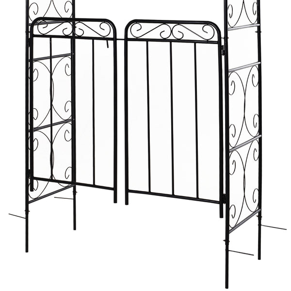 Metal garden arch with scrollwork doors