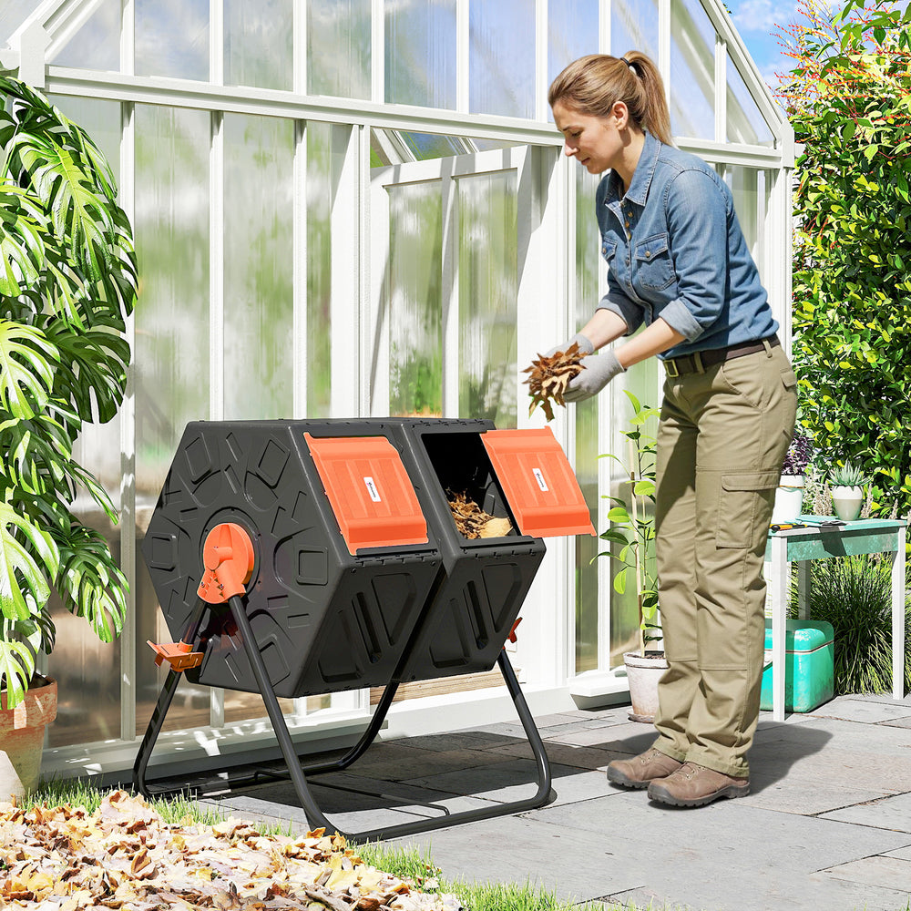 Rotating double-compartment composter with 24 ventilation holes and steel legs, 130 litres, orange